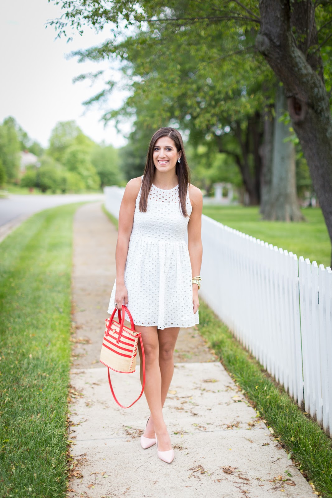 Zappos Footer I am a huge fan of wearing white pieces in warm summer months and this dress is perfect for that. It's wrinkle-free, lightweight and the eyelet detail is so pretty. The bottom half of the dress .
