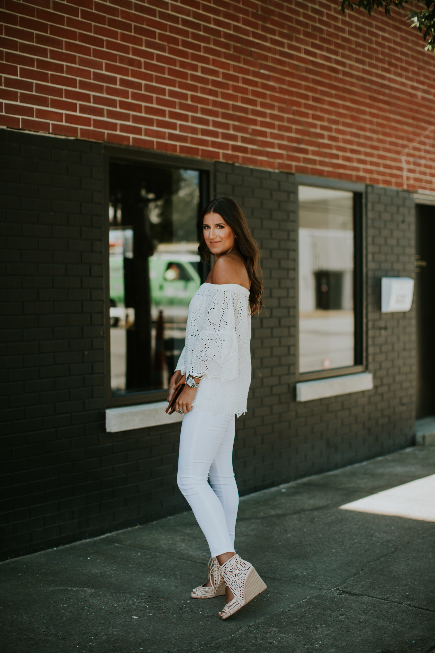 off the shoulder eyelet top, eyelet off the shoulder top, white skinny jeans, jeffrey campbell rayos perforated wedges, sole society clutch, cognac clutch, summer style, all white outfit, white summer outfit // grace wainwright a southern drawl