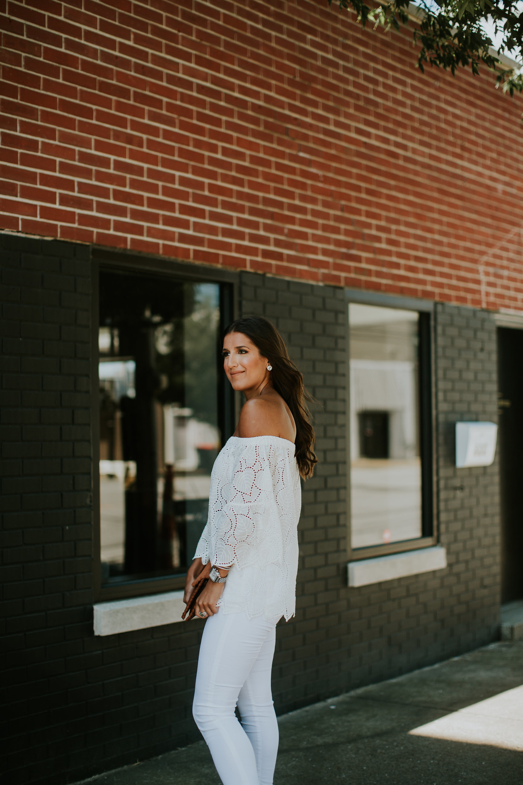 off the shoulder eyelet top, eyelet off the shoulder top, white skinny jeans, jeffrey campbell rayos perforated wedges, sole society clutch, cognac clutch, summer style, all white outfit, white summer outfit // grace wainwright a southern drawl