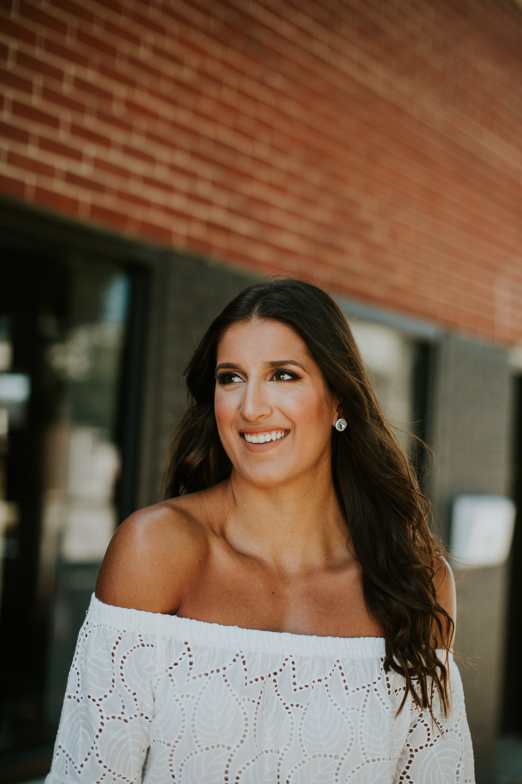 off the shoulder eyelet top, eyelet off the shoulder top, white skinny jeans, jeffrey campbell rayos perforated wedges, sole society clutch, cognac clutch, summer style, all white outfit, white summer outfit // grace wainwright a southern drawl