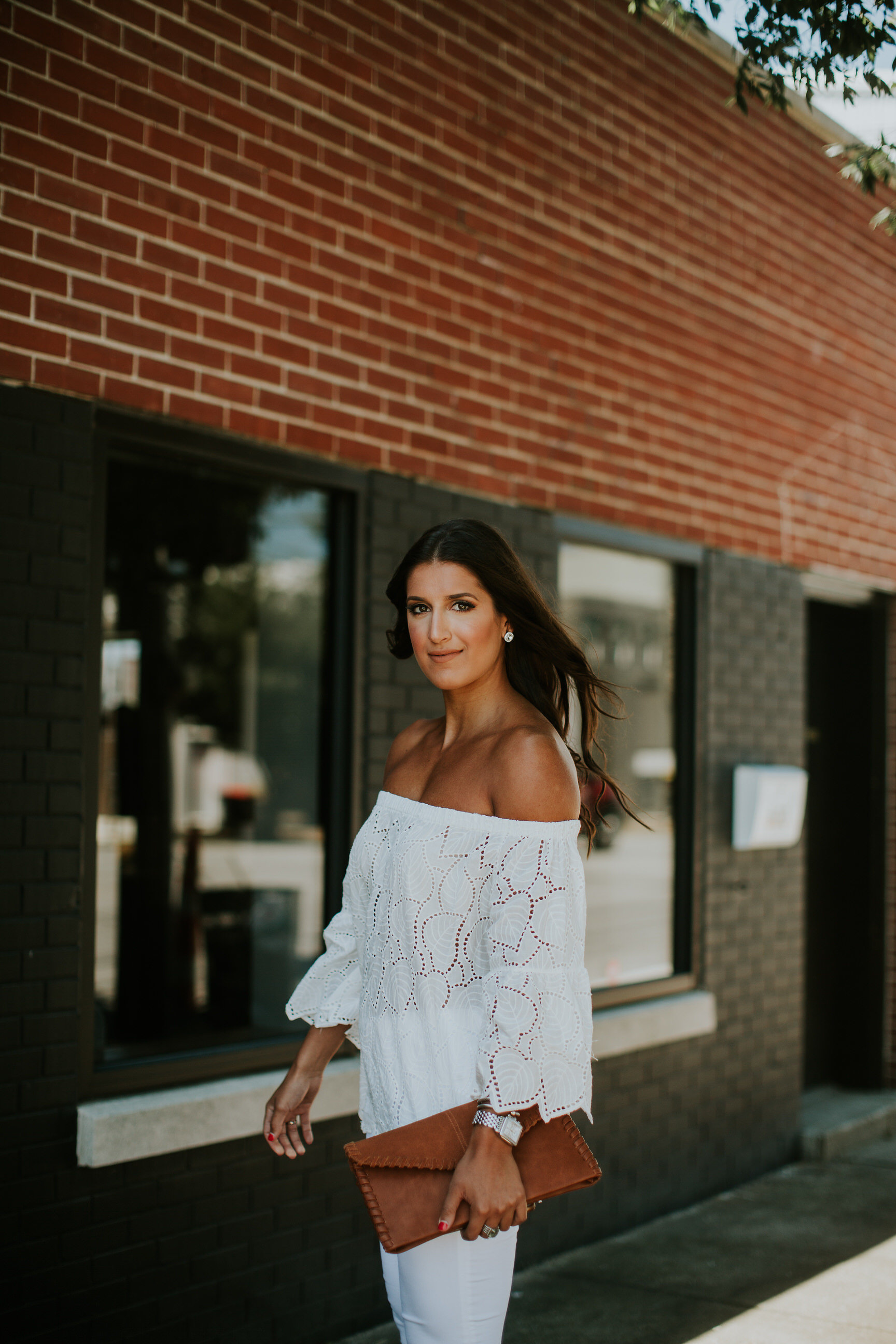 off the shoulder eyelet top, eyelet off the shoulder top, white skinny jeans, jeffrey campbell rayos perforated wedges, sole society clutch, cognac clutch, summer style, all white outfit, white summer outfit // grace wainwright a southern drawl